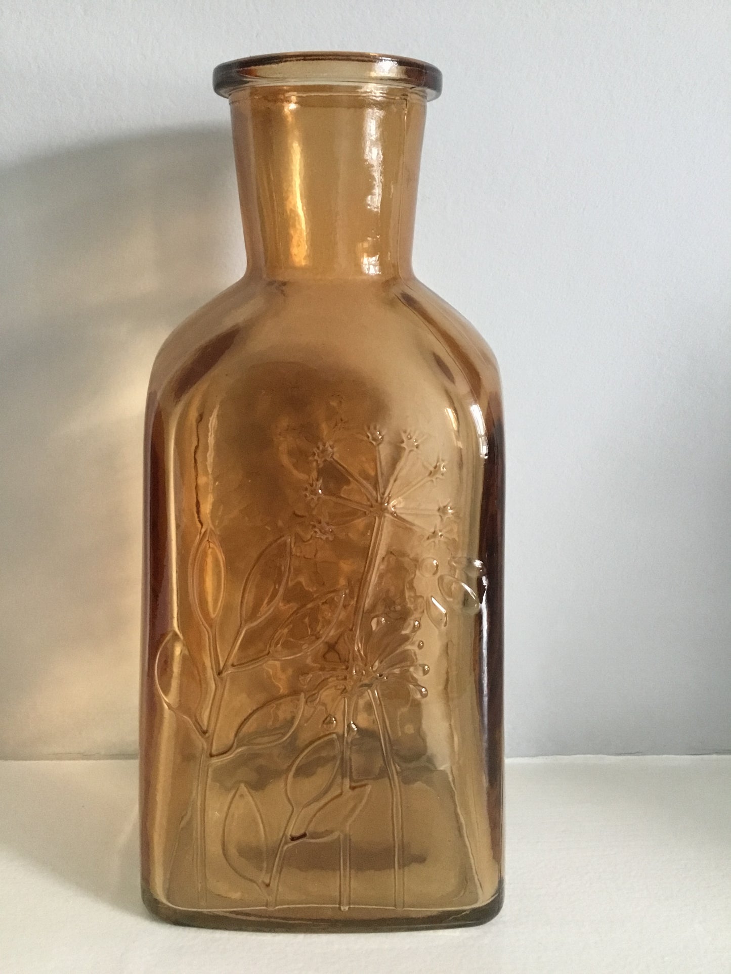 Brown pressed embossed glass vase