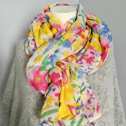 Bright floral scarf with yellow tassels